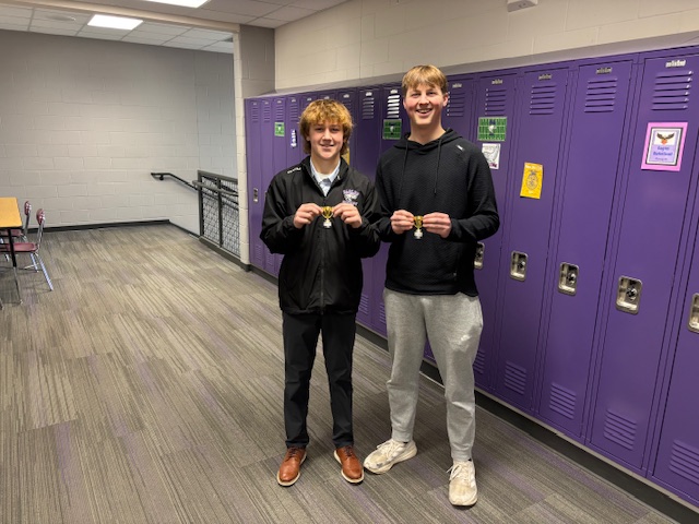 Senior History Through Film students Brecken Neuman (Best Soundtrack) and Cullen Slette (Best Pitch) hold their "Golden Gordon" awards