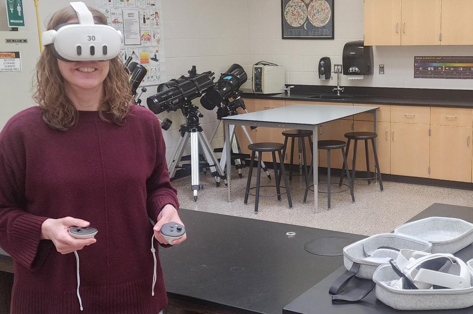 Mrs Brock demonstrating new VR technology in the science dept.