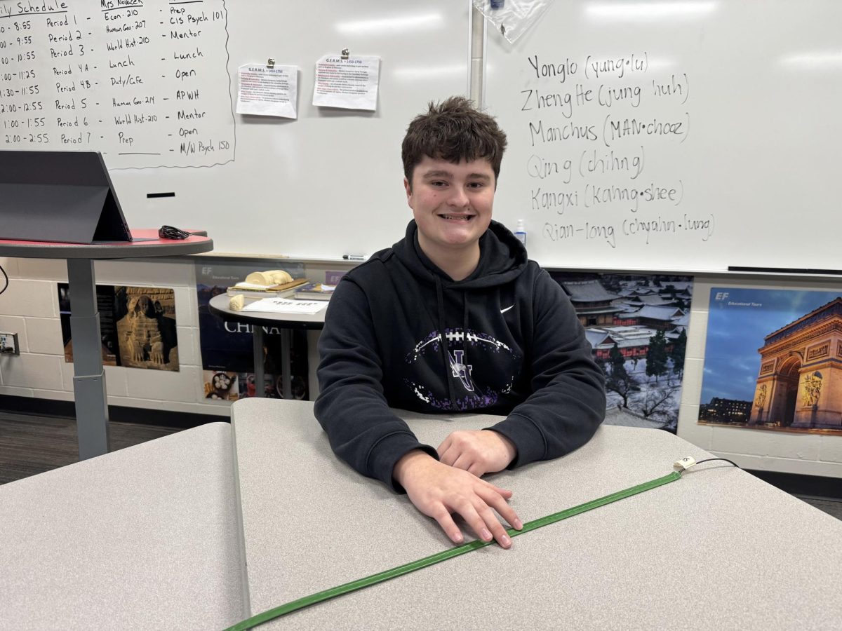 Kaden Schaefer participating at Knowledge Bowl practice in Mr. Bute's room.