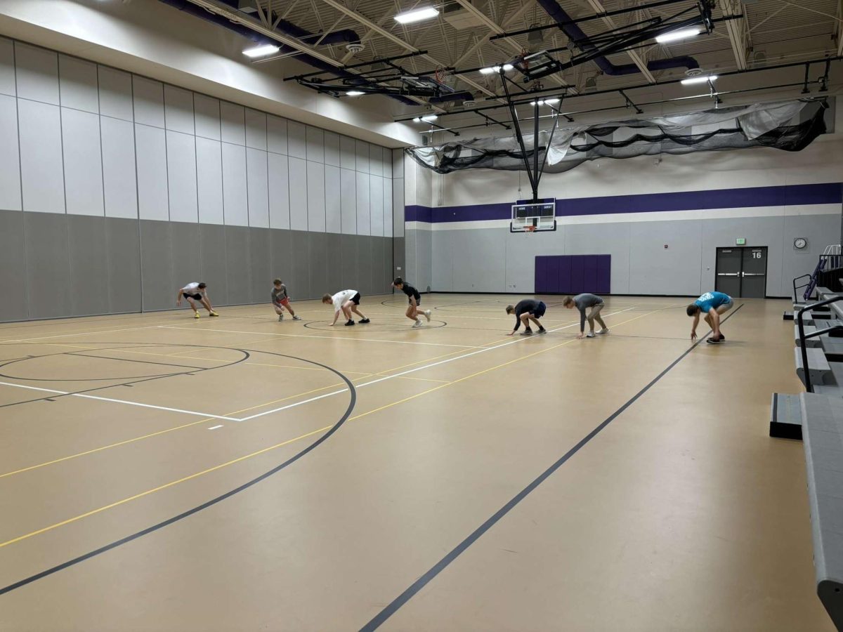 The New Ulm Wrestlers do pyramid sprints at 6:15 AM on February 5th, Wednesday Morning. 