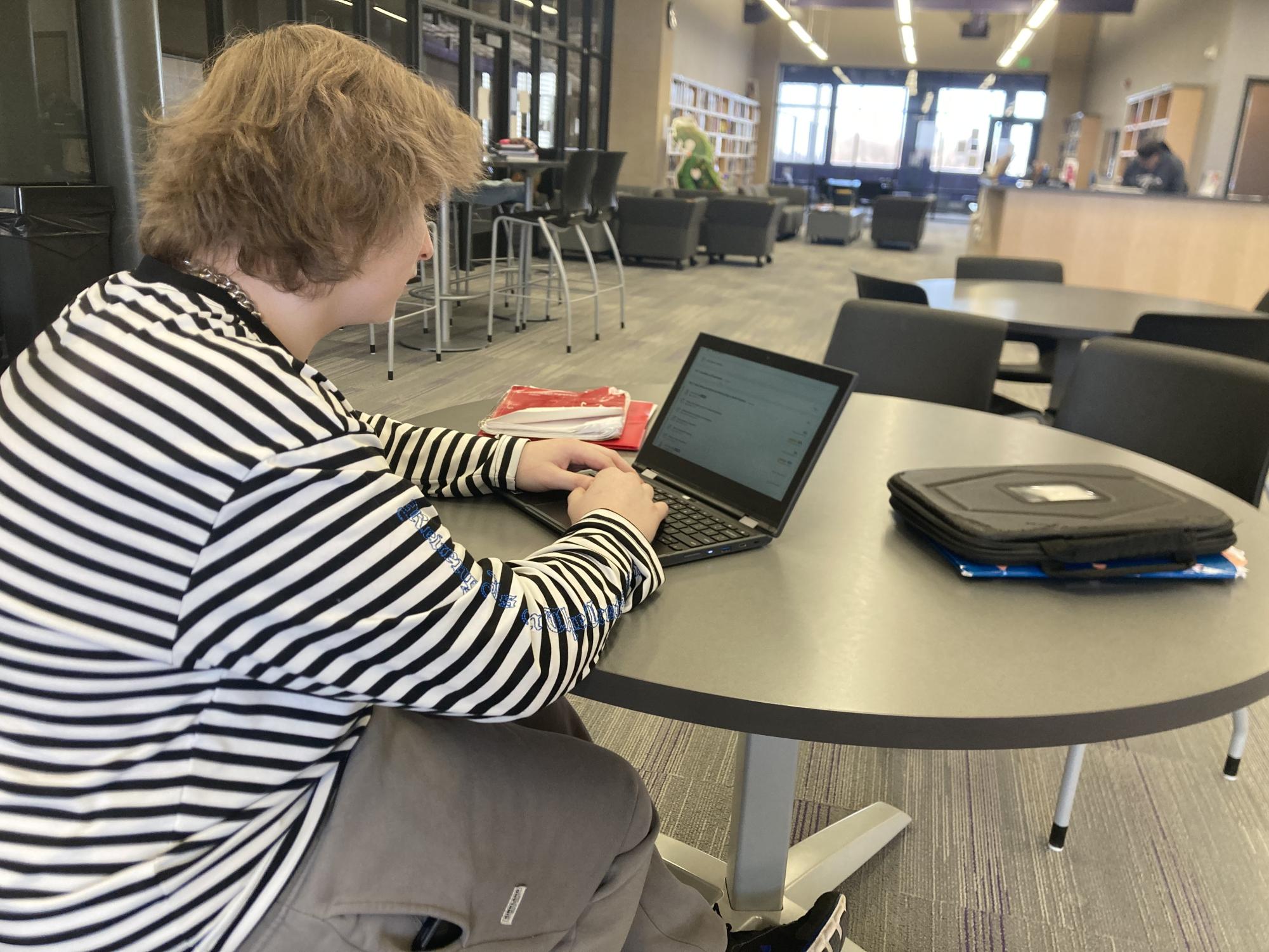 Sylas Hacker, a senior at NUHS, has been spending his resource period in the school library to recover two lost credits, instead of his usual open lunch.