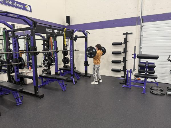 Off season lifter Landon Matter performs a hang clean after school on Feb 6