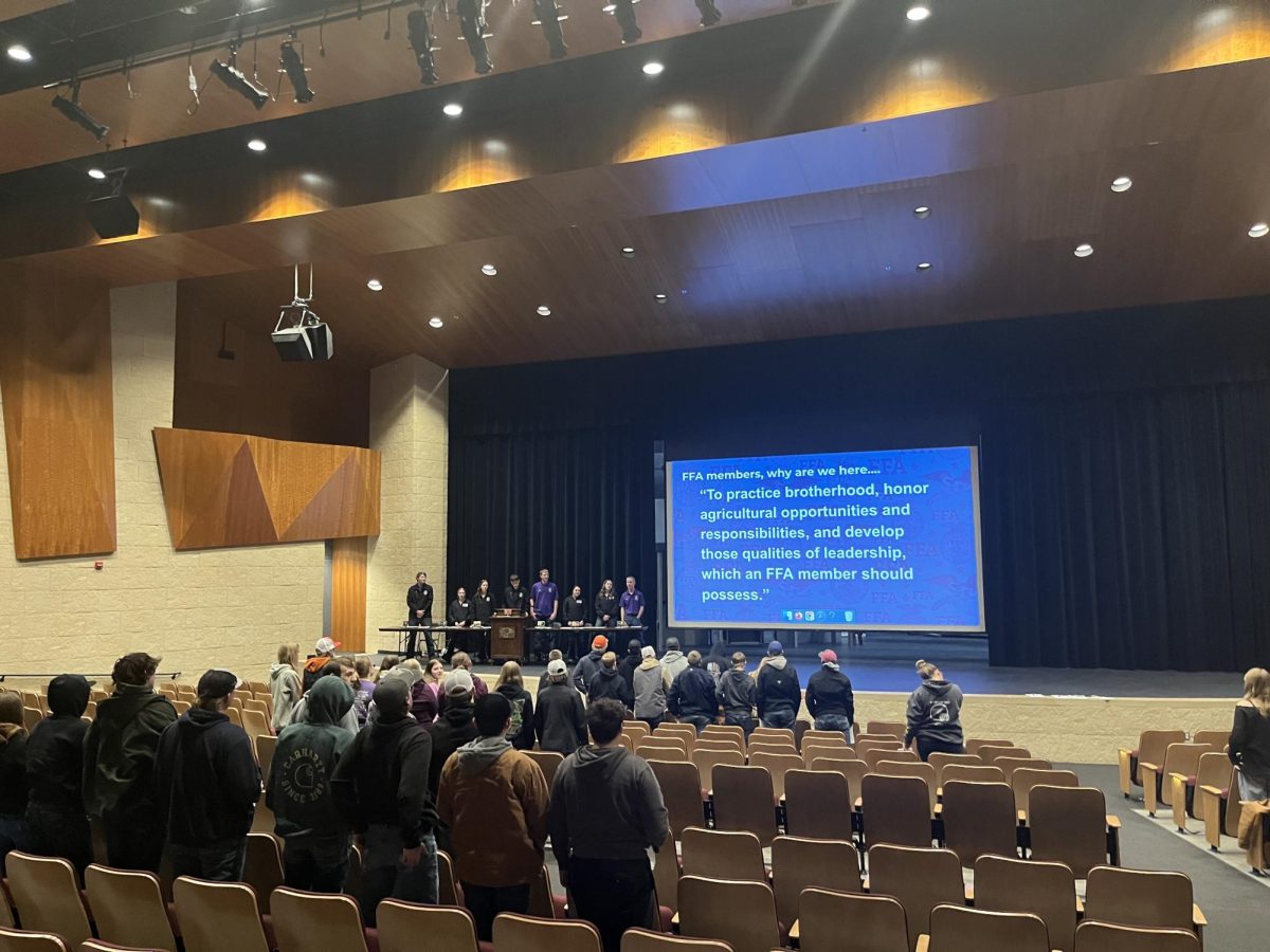 New Ulm FFA Members met on Monday Feb 3 in the high school auditorium. The FFA Members are saying the FFA cred "To practice brotherhood honor Agriculture opportunities..."