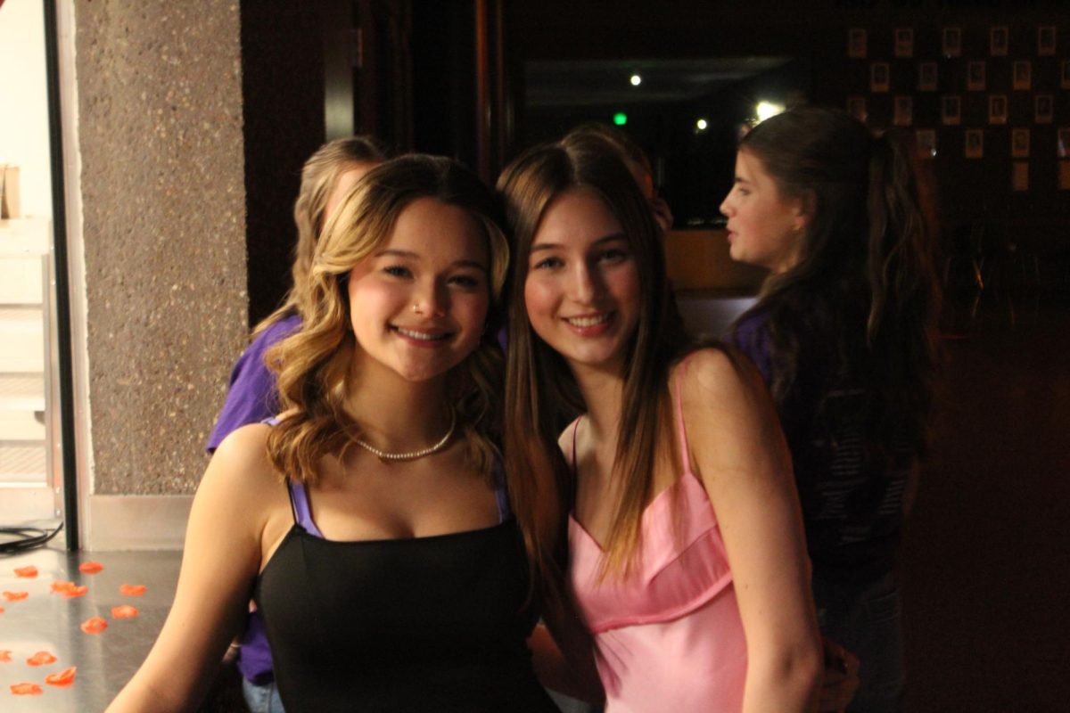 Student Council members Lola Leuth and Greta Benz enjoying the Valentine's Day dance