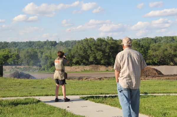New Head Coach James Arndt observes New Ulm Trap Shooting member crush the  clay target.