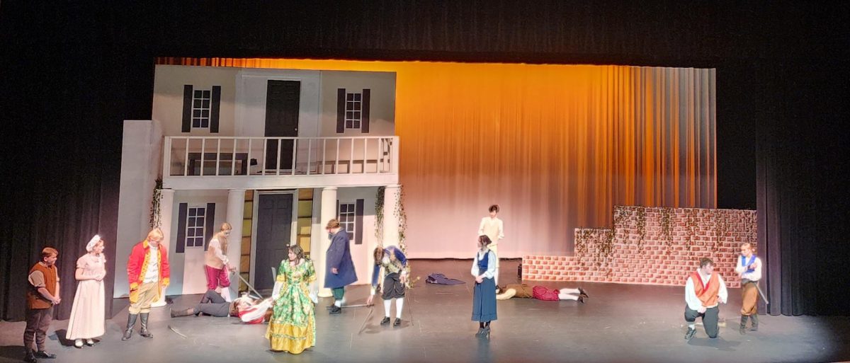Romeo and Juliet actors performing for the school
