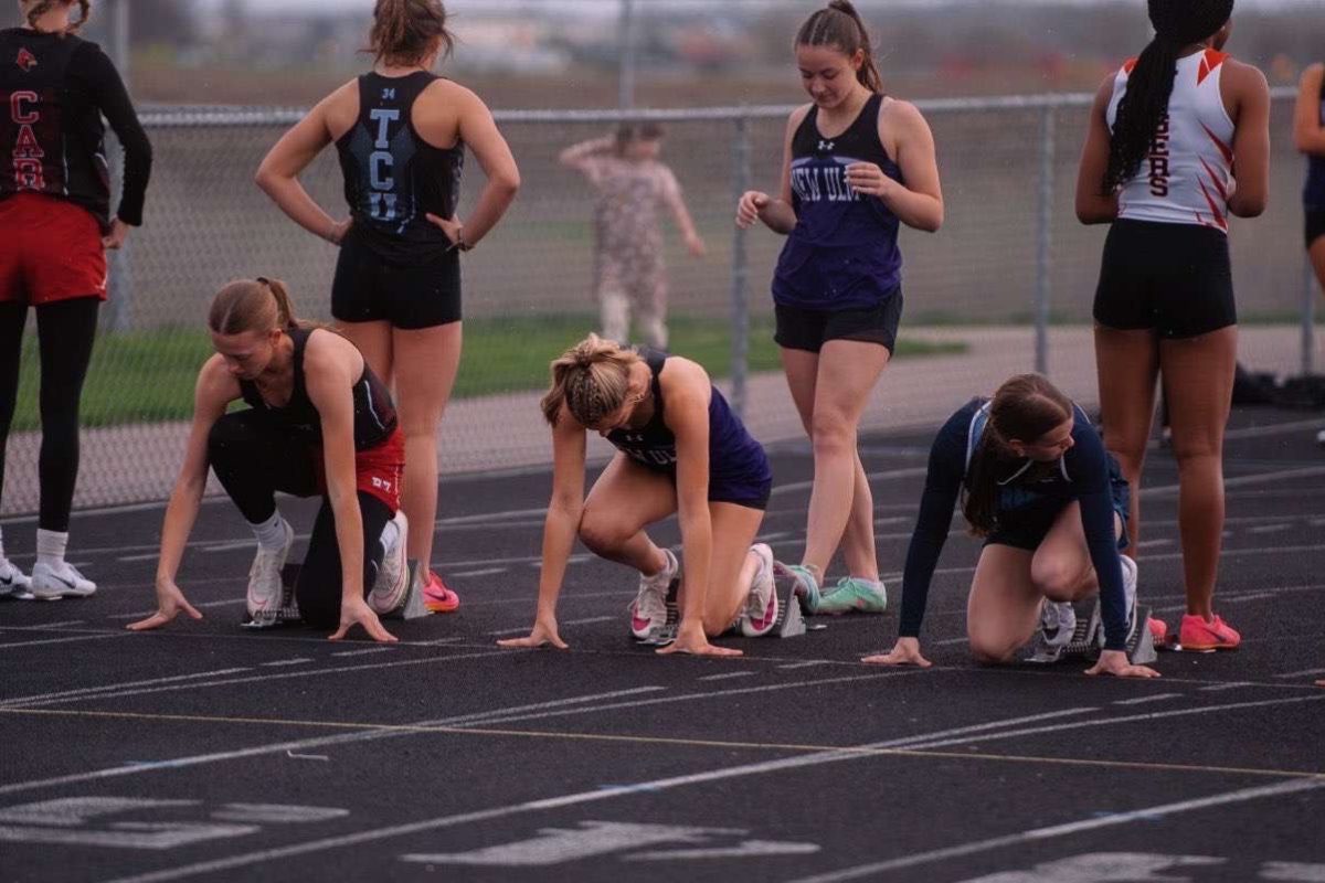 Riley Wilson getting ready to run the 100m.