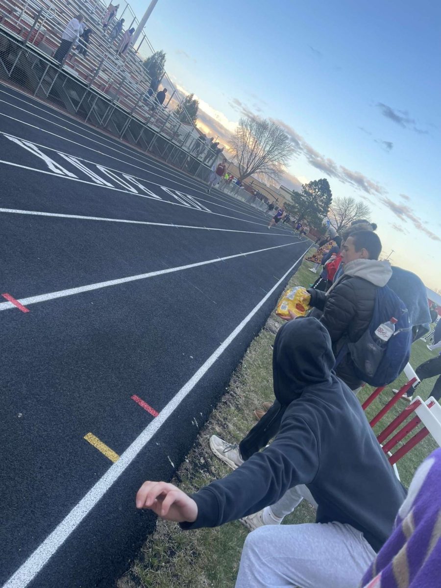 Track athletes competing in an event.