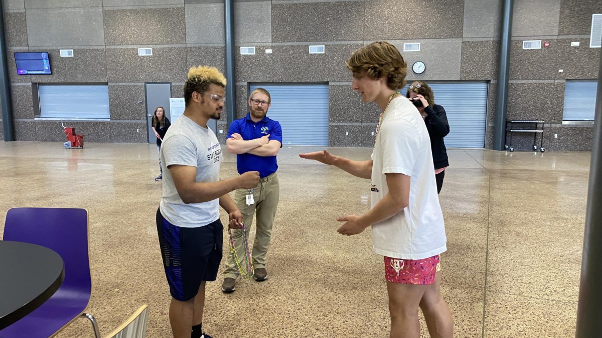 Jamisen Frederickson (left) and Owen Castleman battle it out in the final rounds of the rock paper scissors tournament.