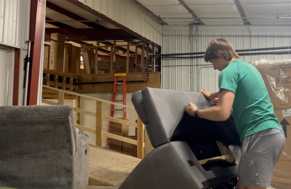 Brody Nordby working on a recliner 