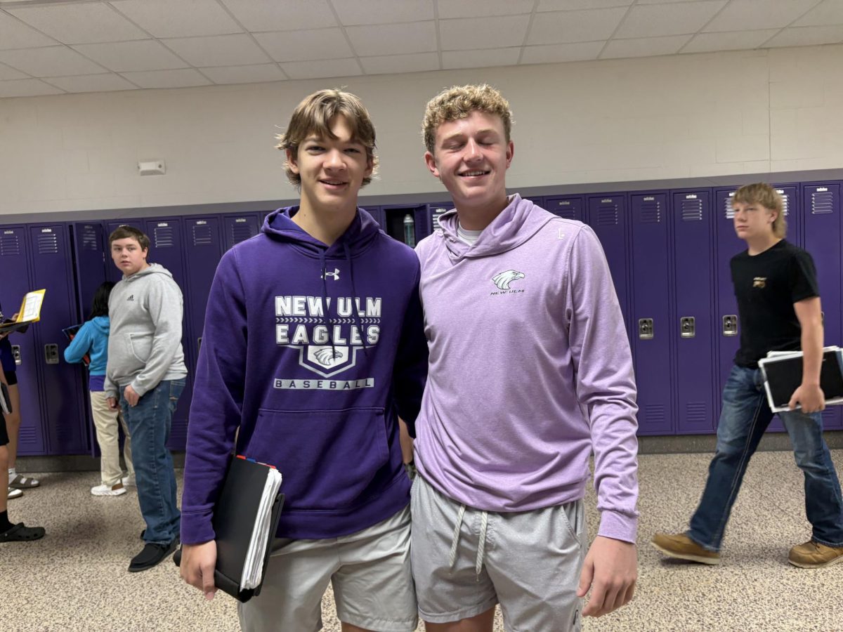 From left: sophomore Trevan Thordson and Junior Mason Buegler deck out in purple for purple day  