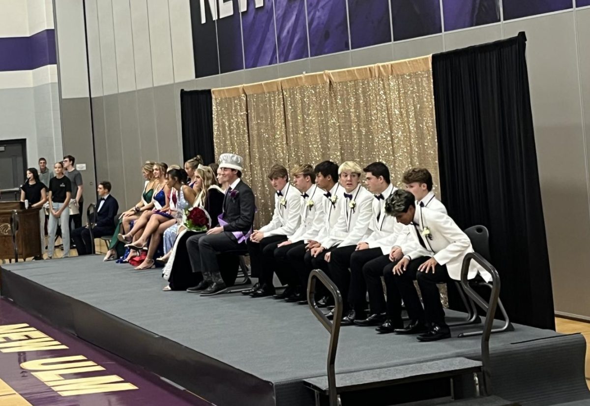 Current homecoming court takes their seats before the events of the evening coronation begins