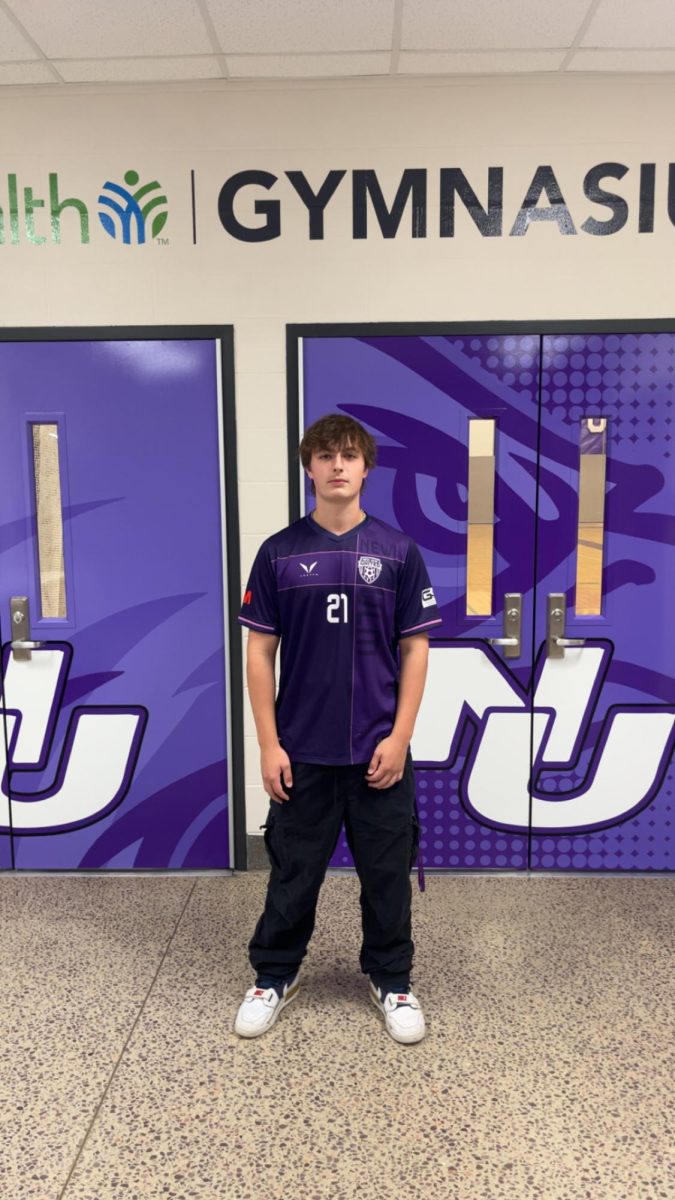 New Ulm High School Junior Brahm DeMarais wearing his own Highschool soccer jersey for Ref vs Jersey day for homecoming 2025 