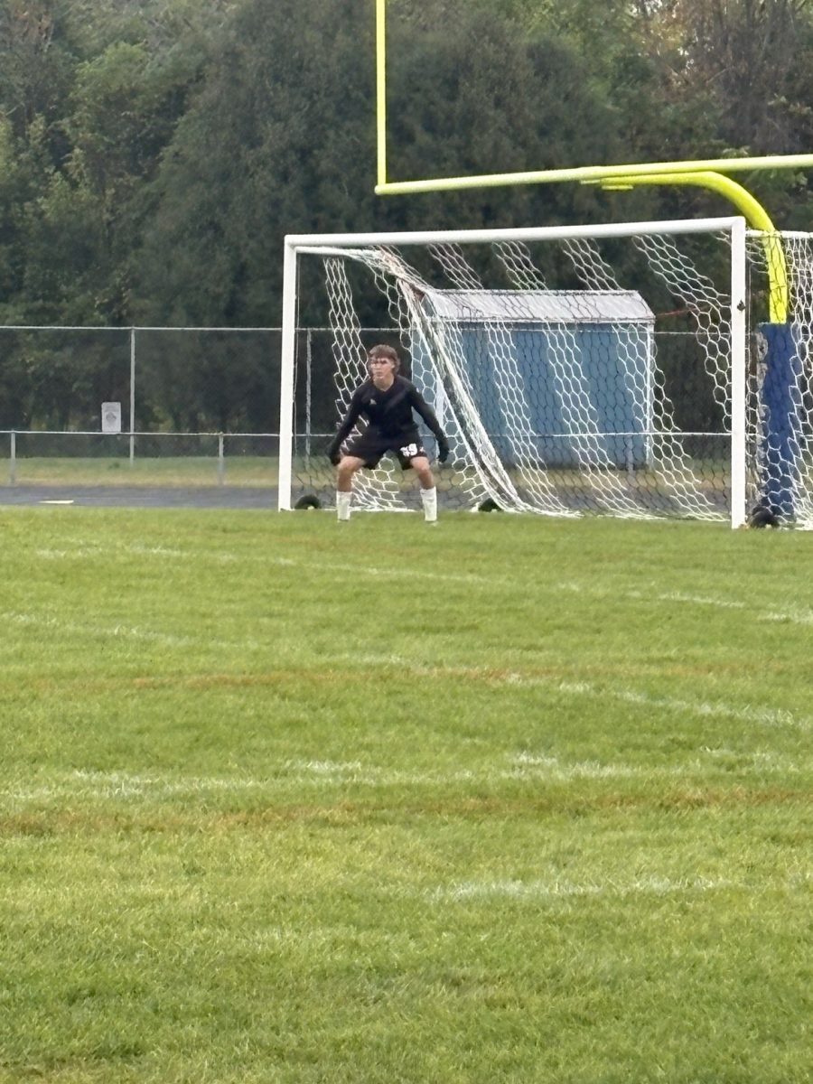 New Ulm Varsity goalie Austin Krohn getting ready to keep the goal 