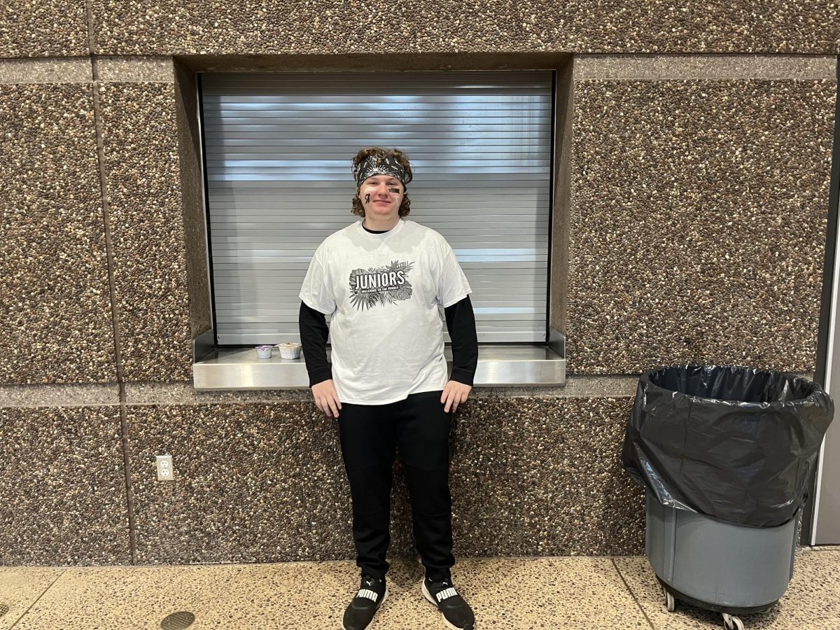 New Ulm High School junior Warren Petterson dressing up in white for battle of the classes for New Ulm Public homecoming 2025 