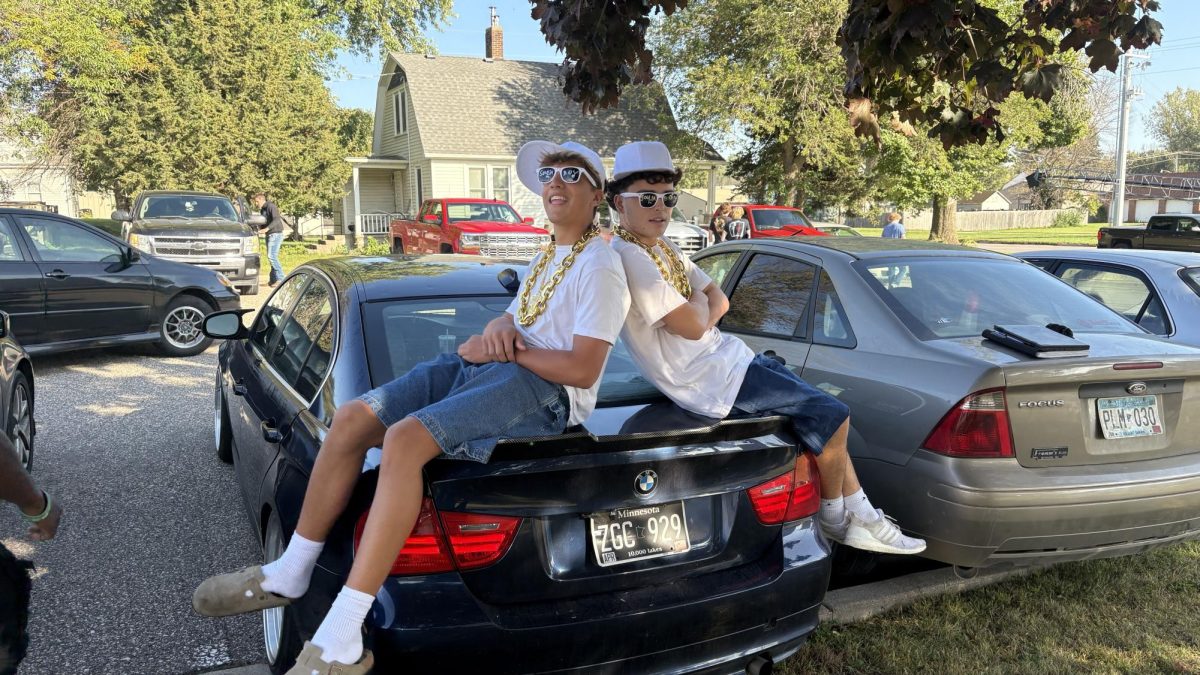 left to right seniors Braylon Jensen and Jullian Hanson dressed up as Soulja Boy for twin day 