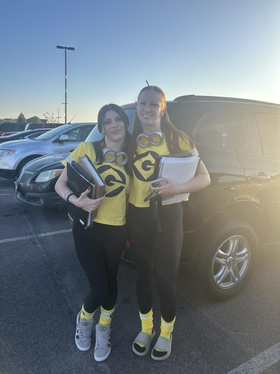 Left to Right Siana Friedrich-Reyes and Avarey Sellner are twinning as minions for twin day during Homecoming week 