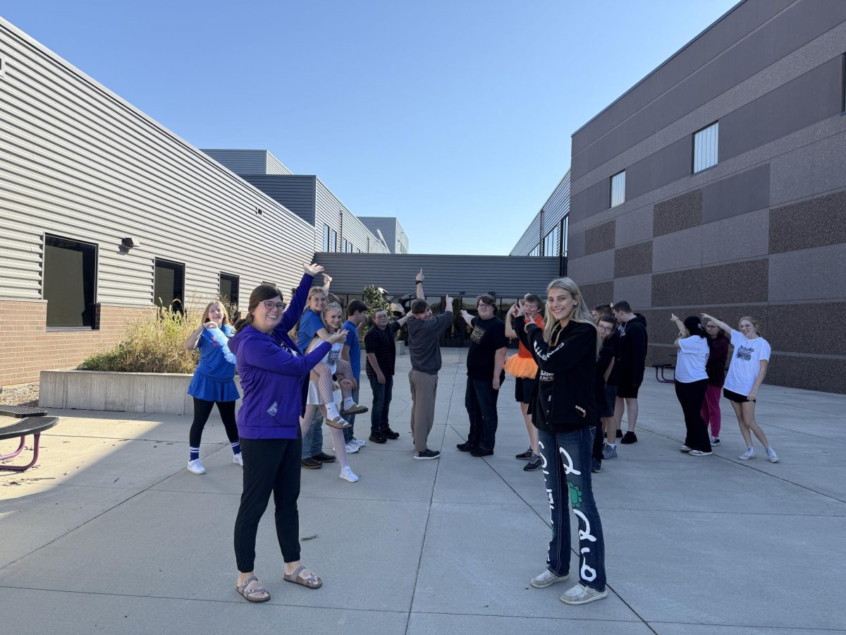 Mrs. Covington's Landscape and greenhouse management class is out and about learning. Mrs. Covington said, "Some of the things we learn in this class are identifying different plants. We went on a walk around the school last week, looking for new ideas for where we can plant more. One of the ideas was to plant on the roof before I retire." 