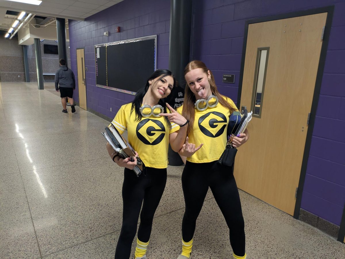 (left to right) Siana Reyes and Averey Sellner dress up as minions for Homecoming week twin day