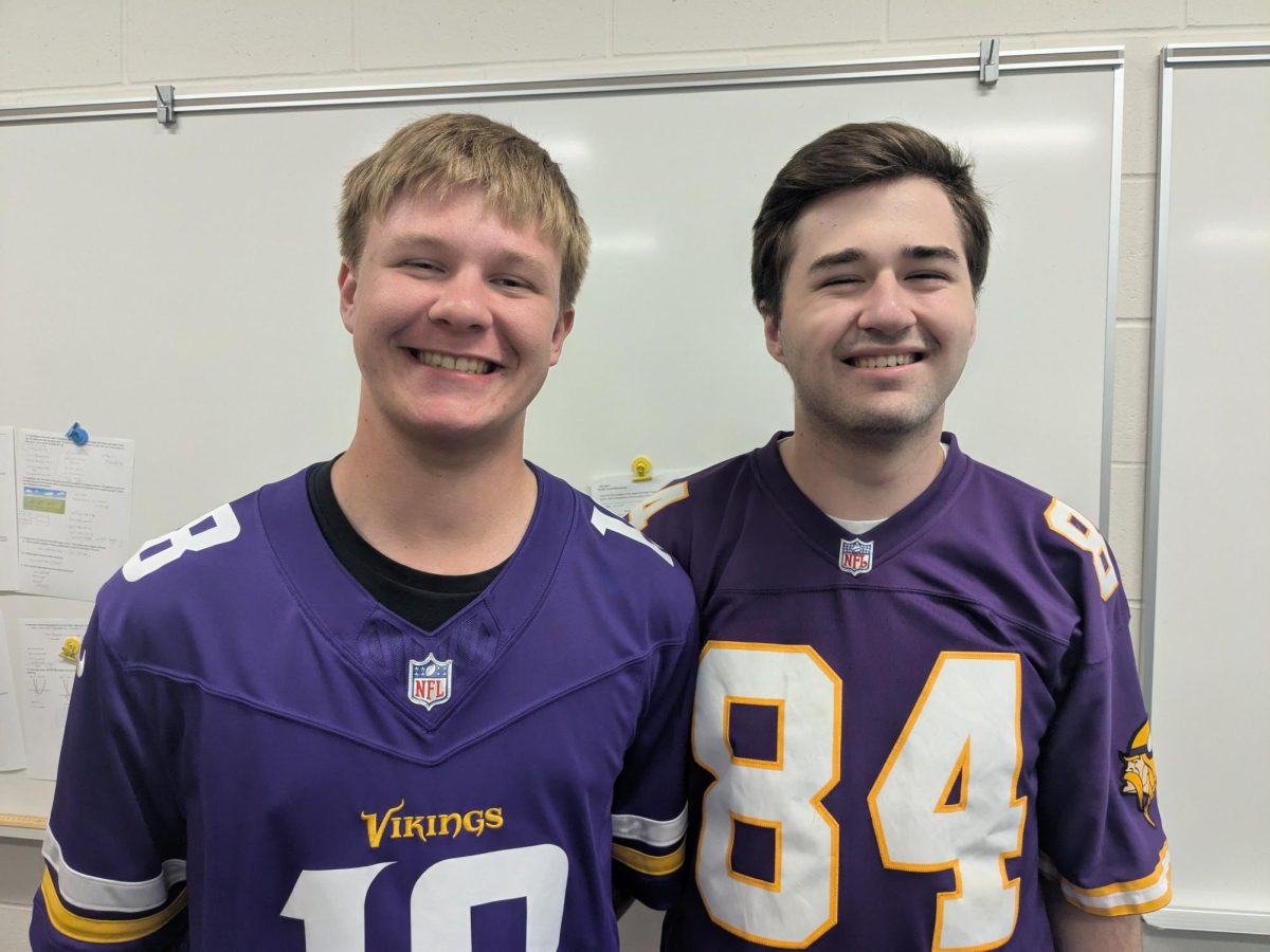 Seniors Hunter Dauer (left) and Tyson Goold (right) wearing Vikings jerseys after Sunday win
