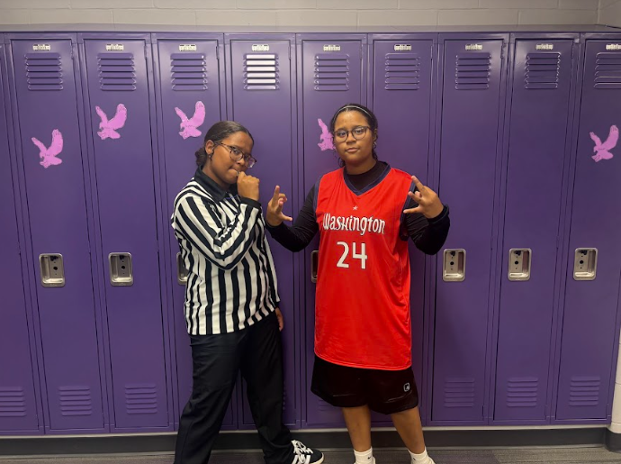 Brielle Evans (L) and Bianca Evans (R) practice reffing and playing for ref vs. player day.