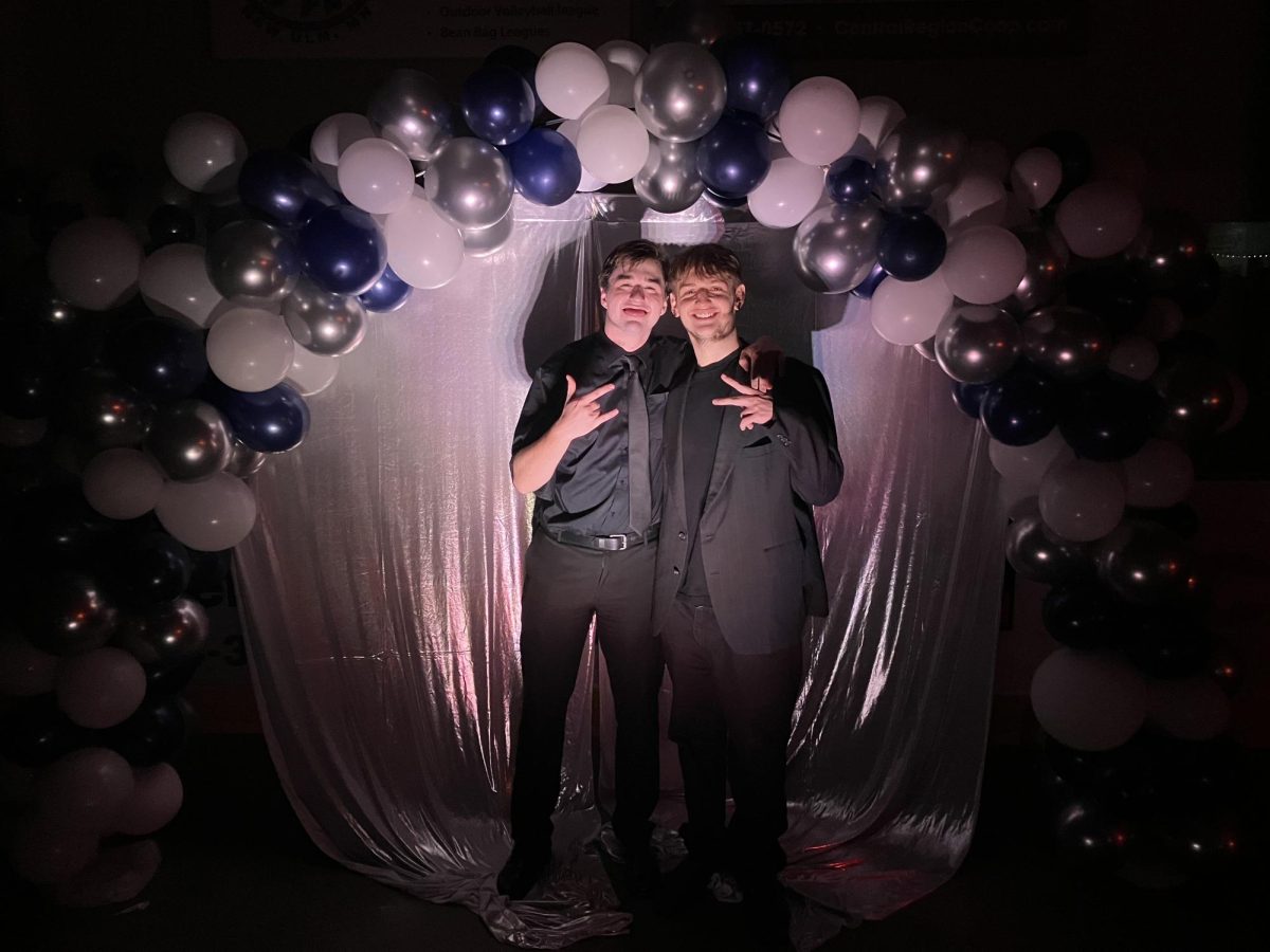 (Left to Right) Seniors Tyson Goold, and Jevin Zamzow wear an all black outfit for Homecoming Night.