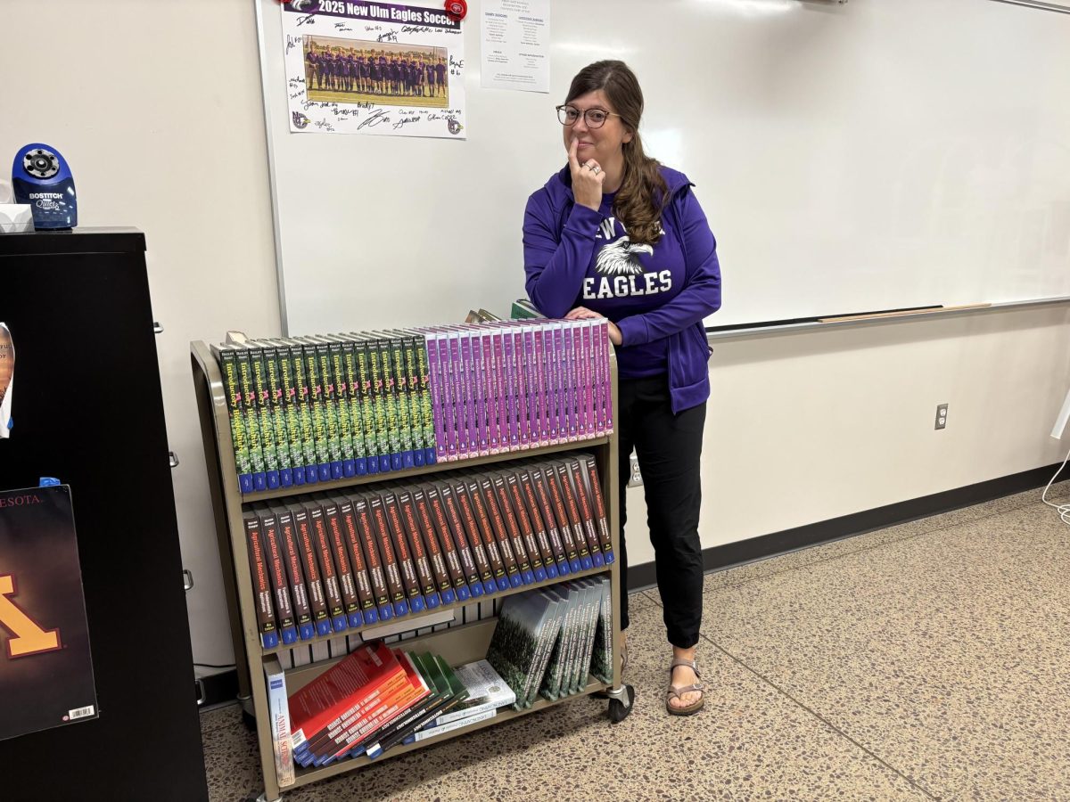 Covington shows a cart of old books that came in from the summer as a mystery 