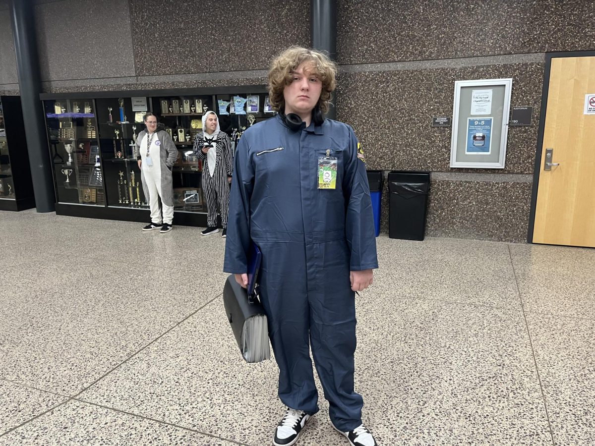 New Ulm High School Jr. Warren Peterson dresses up as a Jurassic park worker for Halloween 2025 