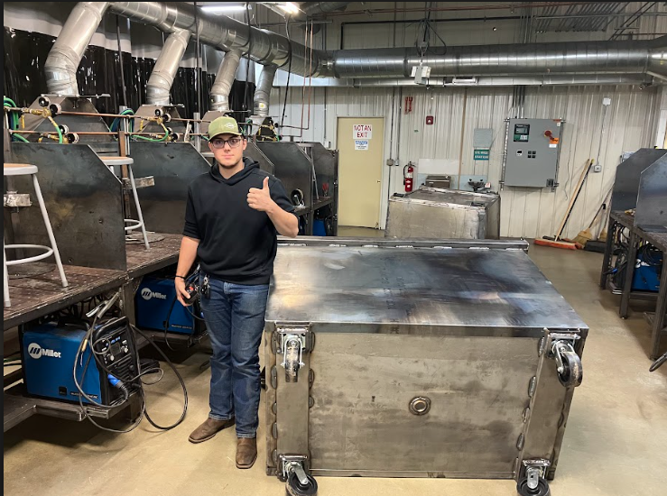 Ethan Jorgensen with his dumpster for RVS