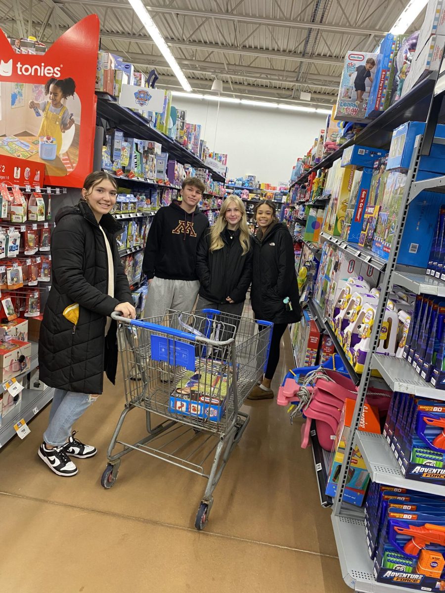 (Left to Right)  Kiera Sullivan, Charlie Weidman, Casey Johnson, and Kaylee Evans Shopping for FCCLA's Santa's Closet