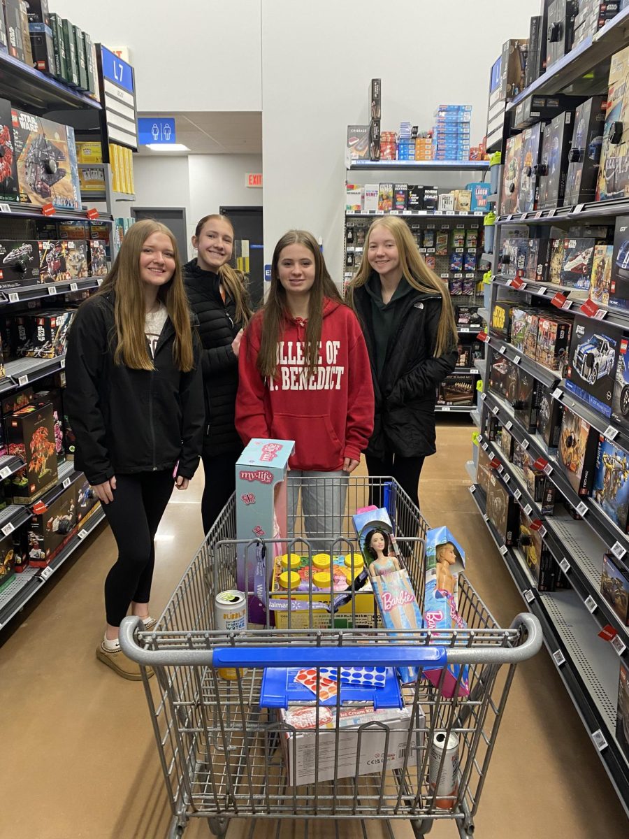 (Left to Right) Lauren Hintz, Emma Beranek, Grace Barie, and Mylah Budahn Shopping for FCCLA's Santa's Closest