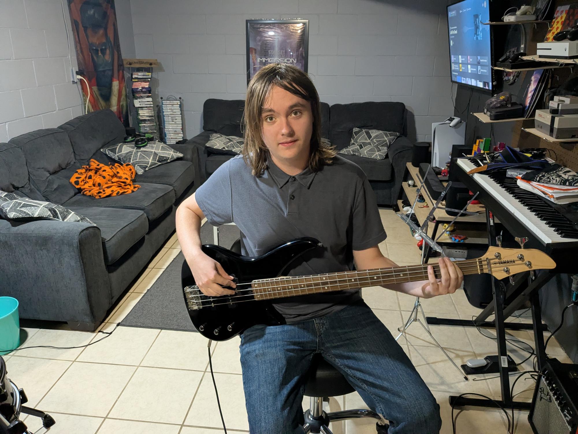 Senior Johnathan Meier playing his bass