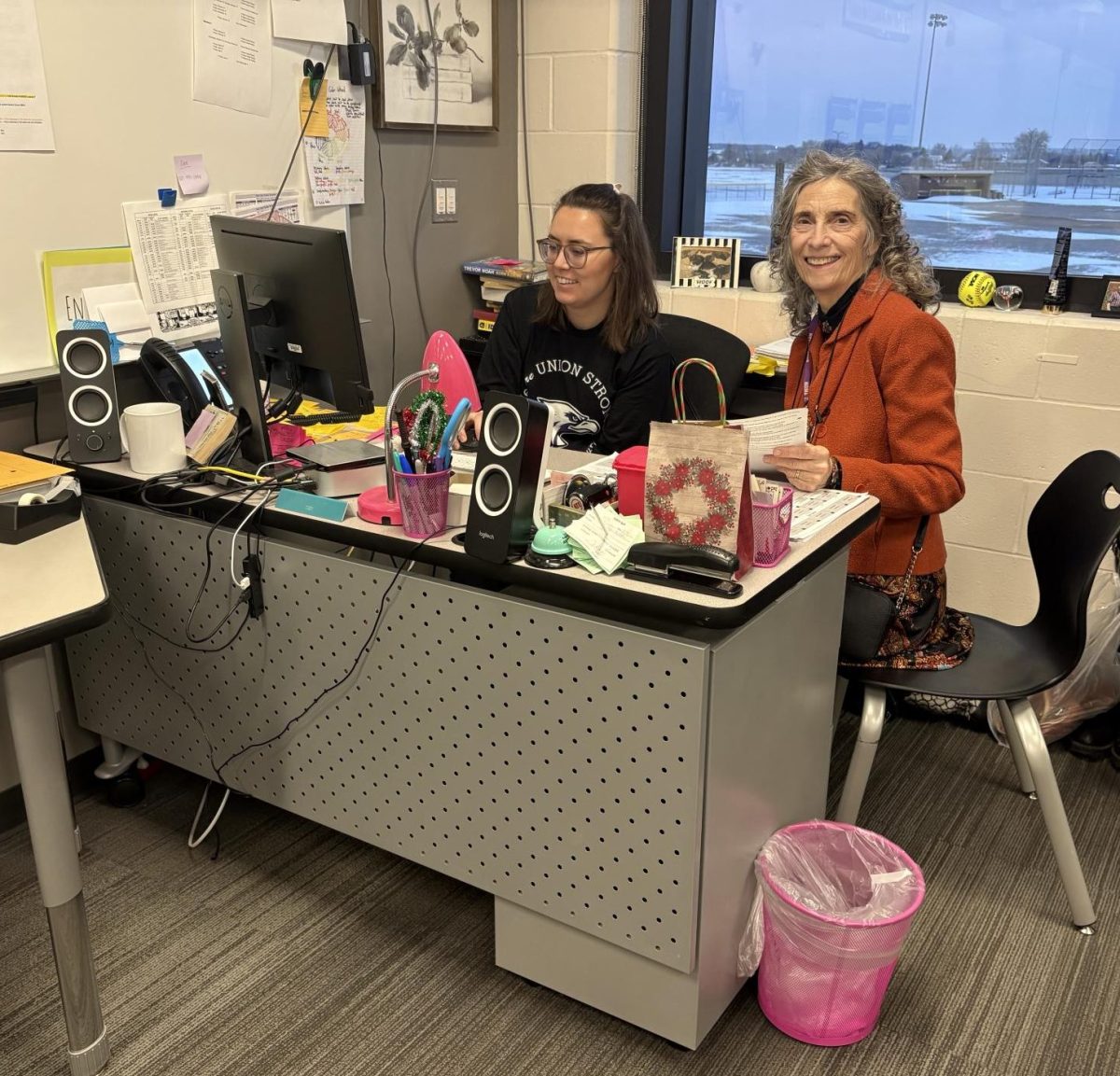Mrs. Cowles helping Mrs. Kordahl get familiar with the digital side of the job. 