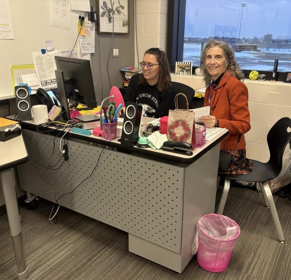 Mrs. Cowles helping Mrs. Kordahl get familiar with the digital side of the job. 