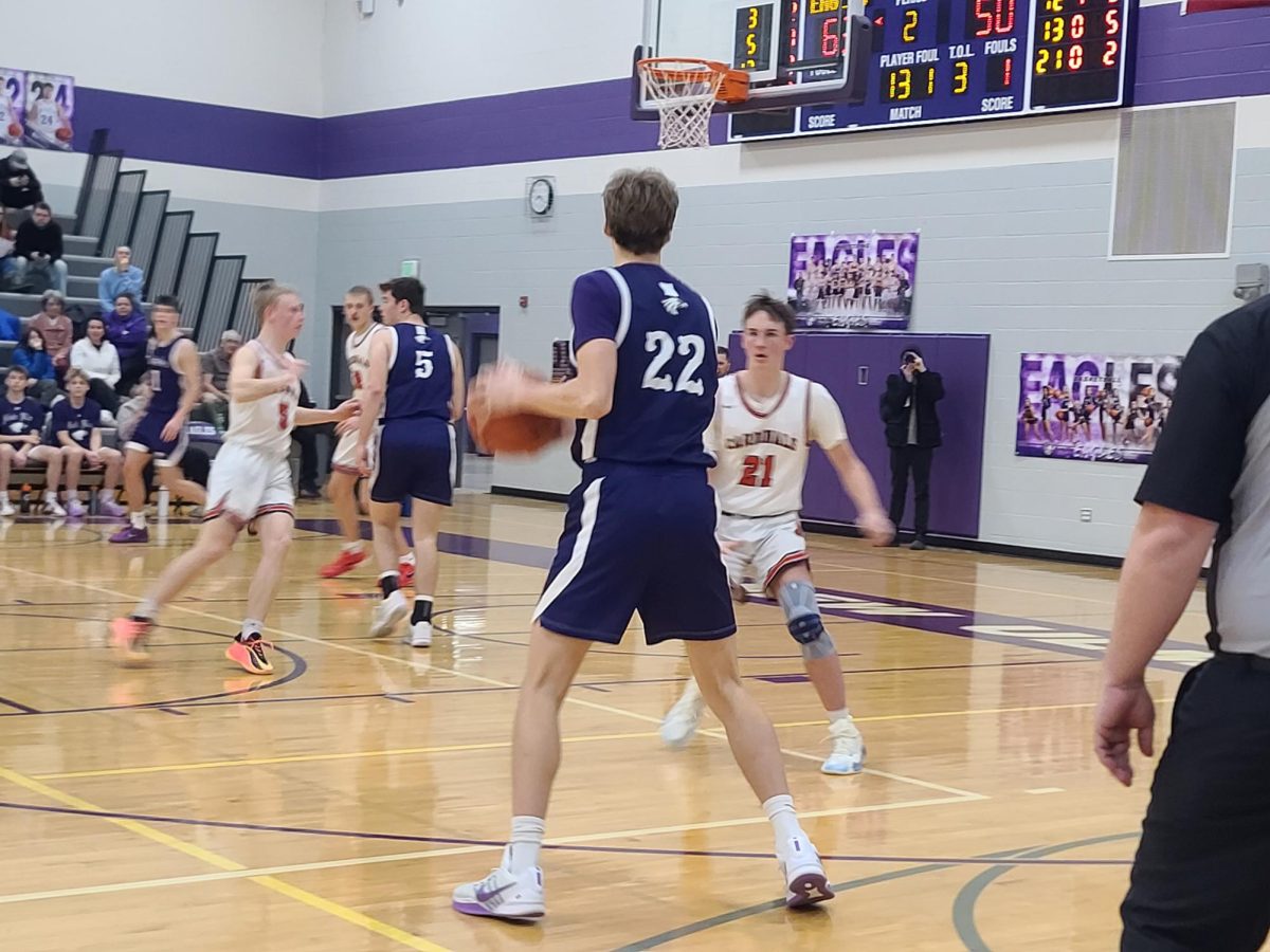 Junior forward Noah Mertz eyes up he hoop before driving for a layup