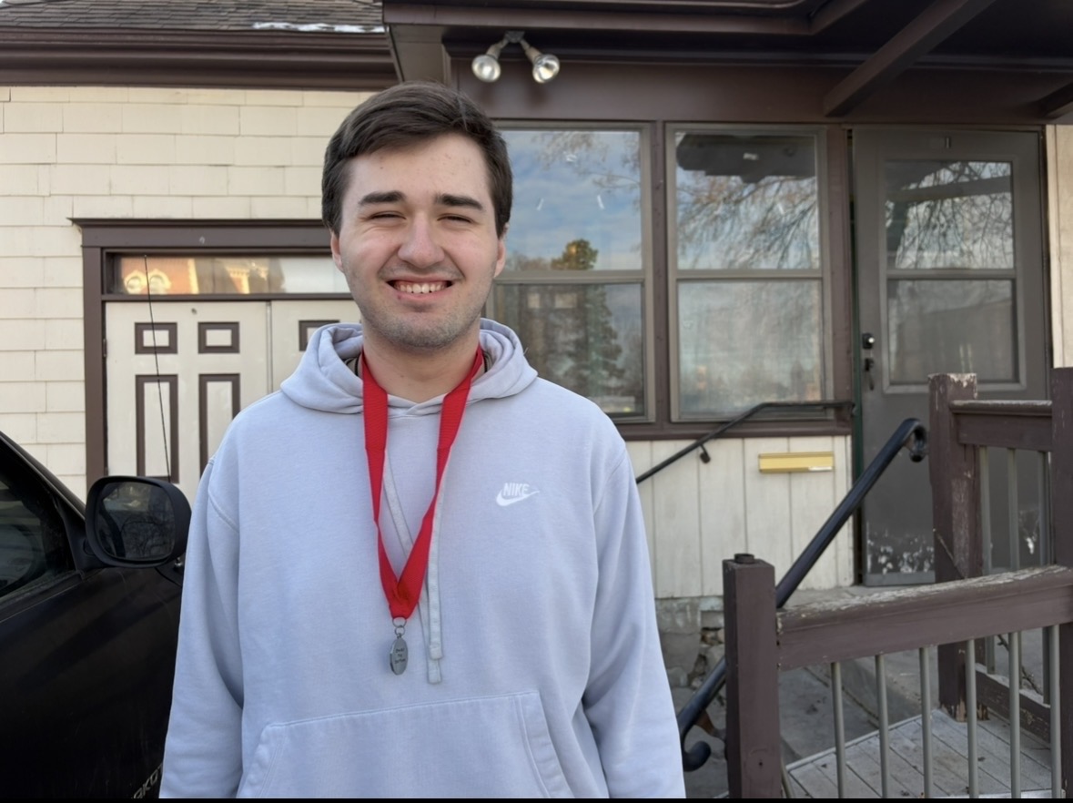 Senior Tyson Gould wearing his medal from the one-act.