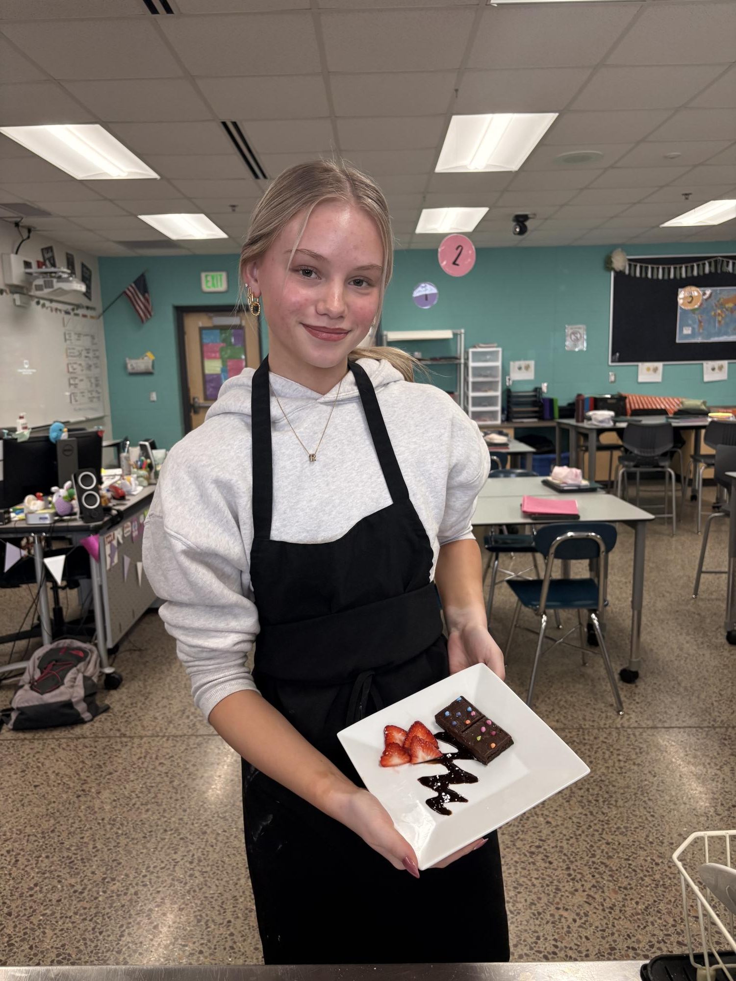 Junior Genesis Rabe showing off her gourmet Cosmic Brownie.