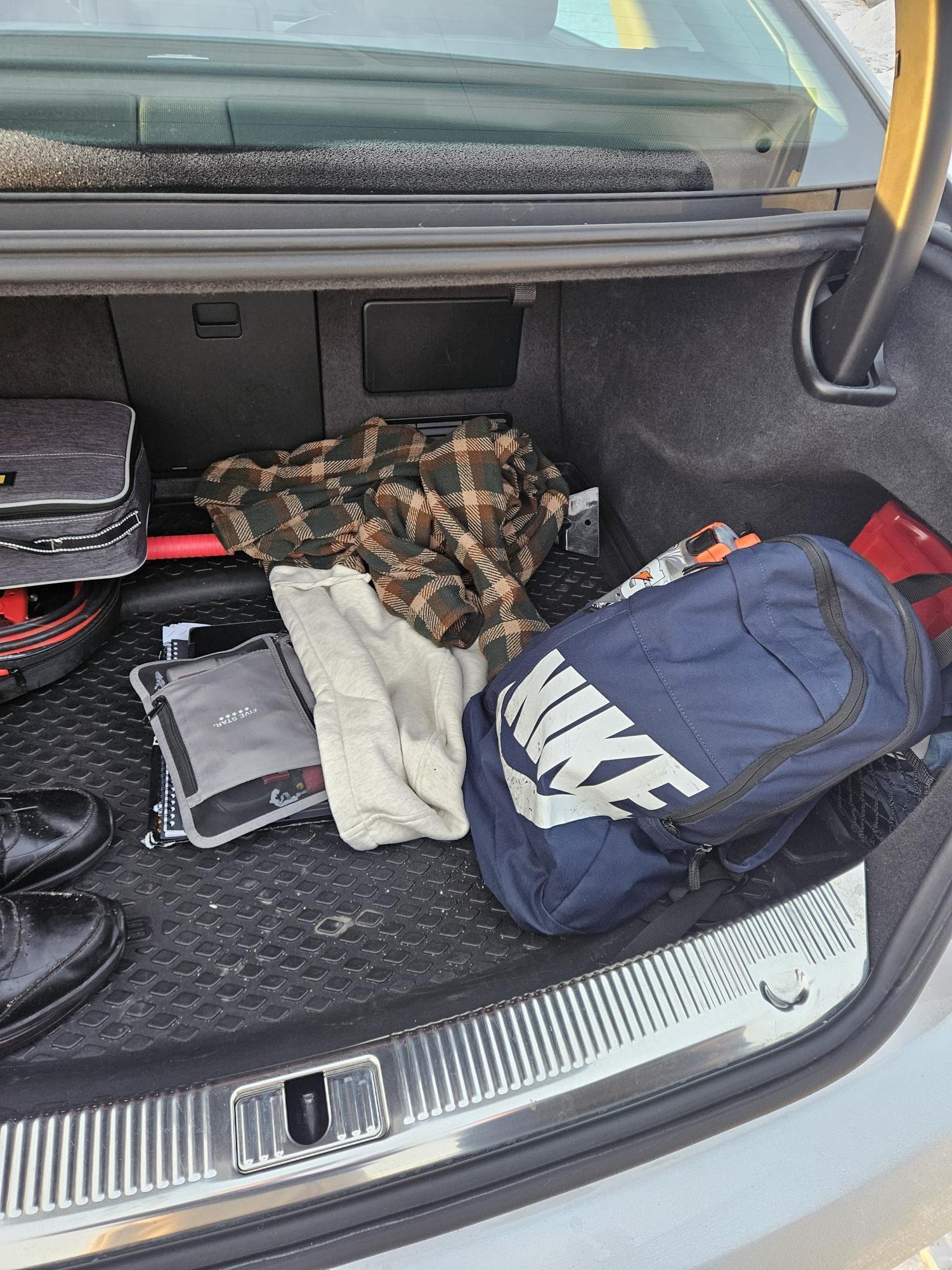 Rylee Rose's car trunk that also doubles as his locker.