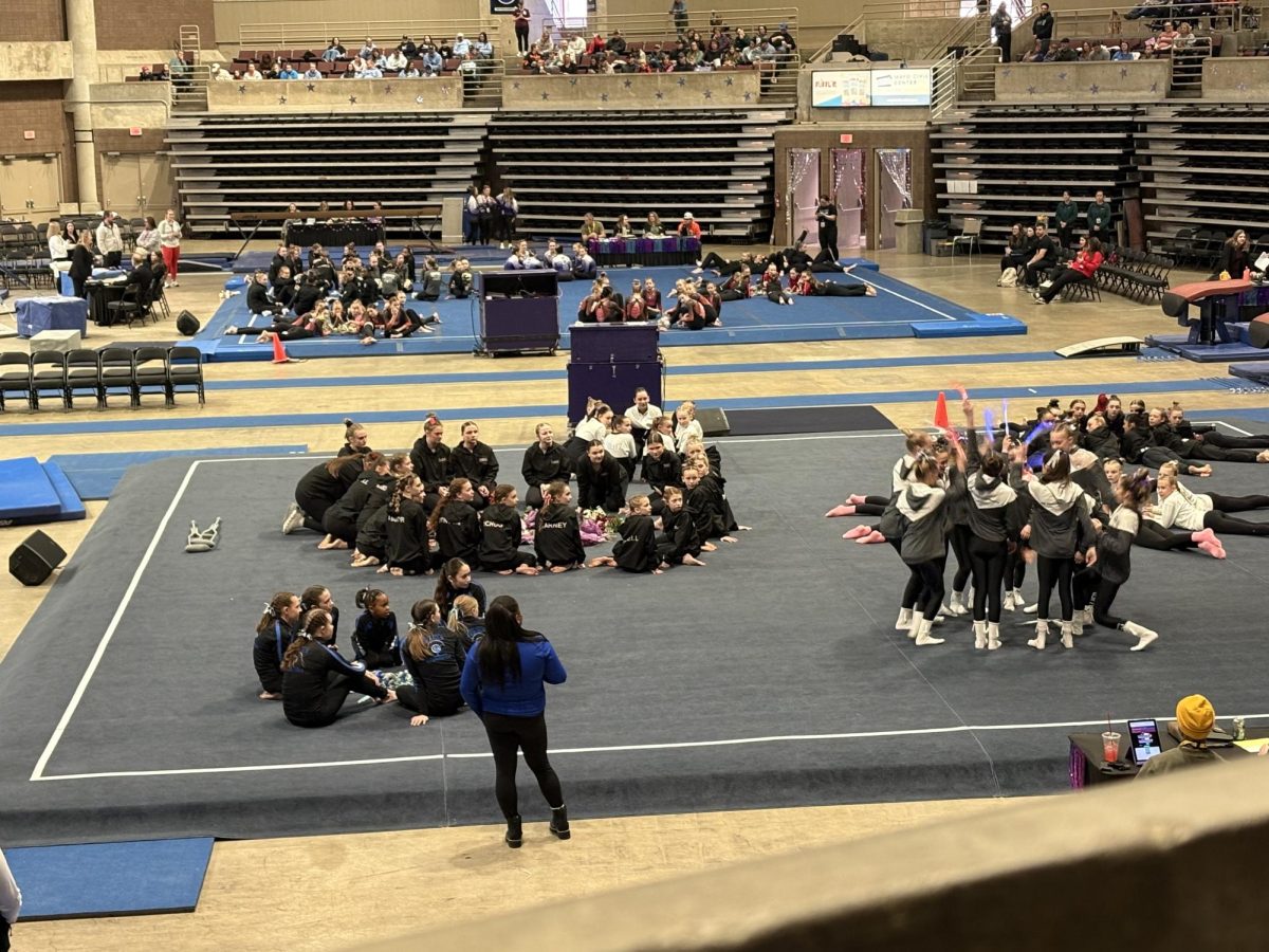Eagle team chanting their open cheer to show their in it to win it.