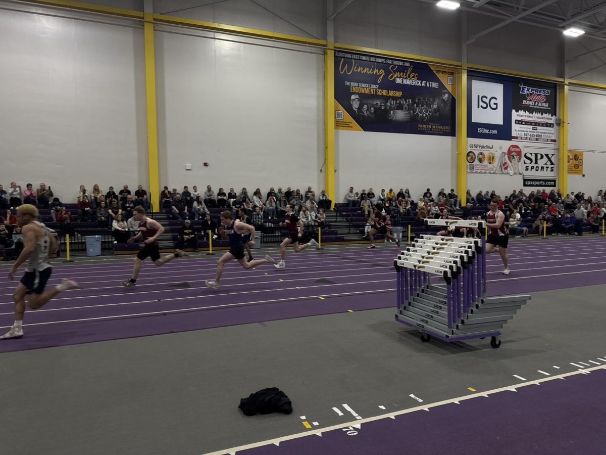 Sabastian Gusso running a 60 meter 