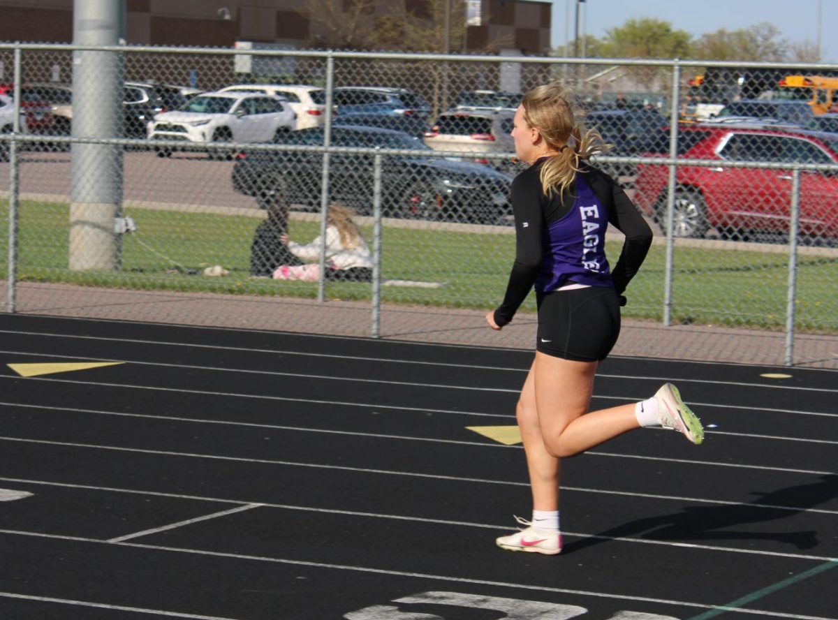 Stella Fischer gets ready to run in the girls 4x2