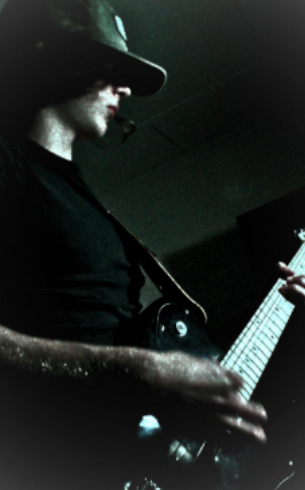 Addison Olson playing guitar