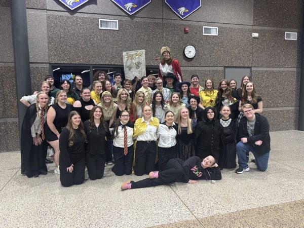 The Puffs cast takes their cast photo at the end of opening night