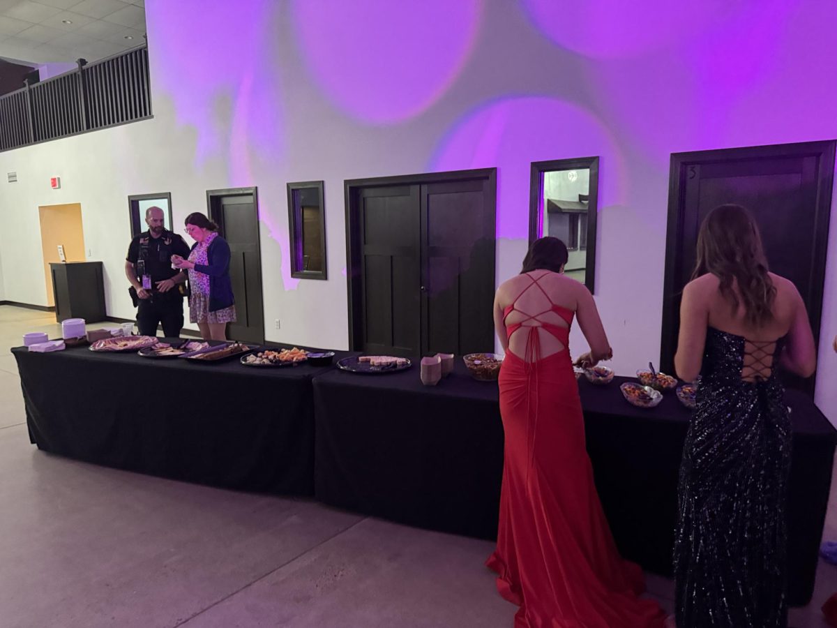 Students enjoy the many snacks provided at the prom dance