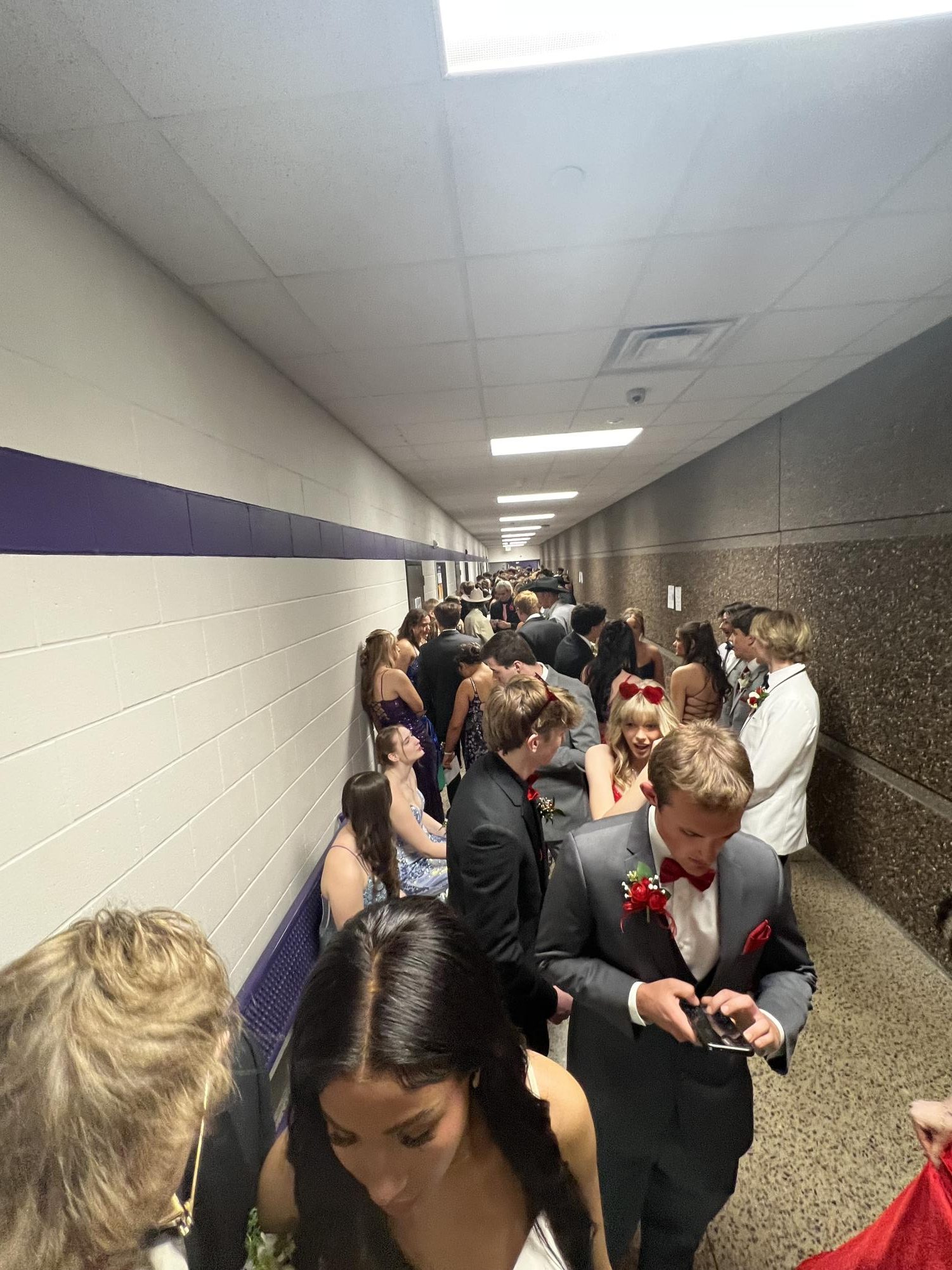 Many students wait in line for the Grand March