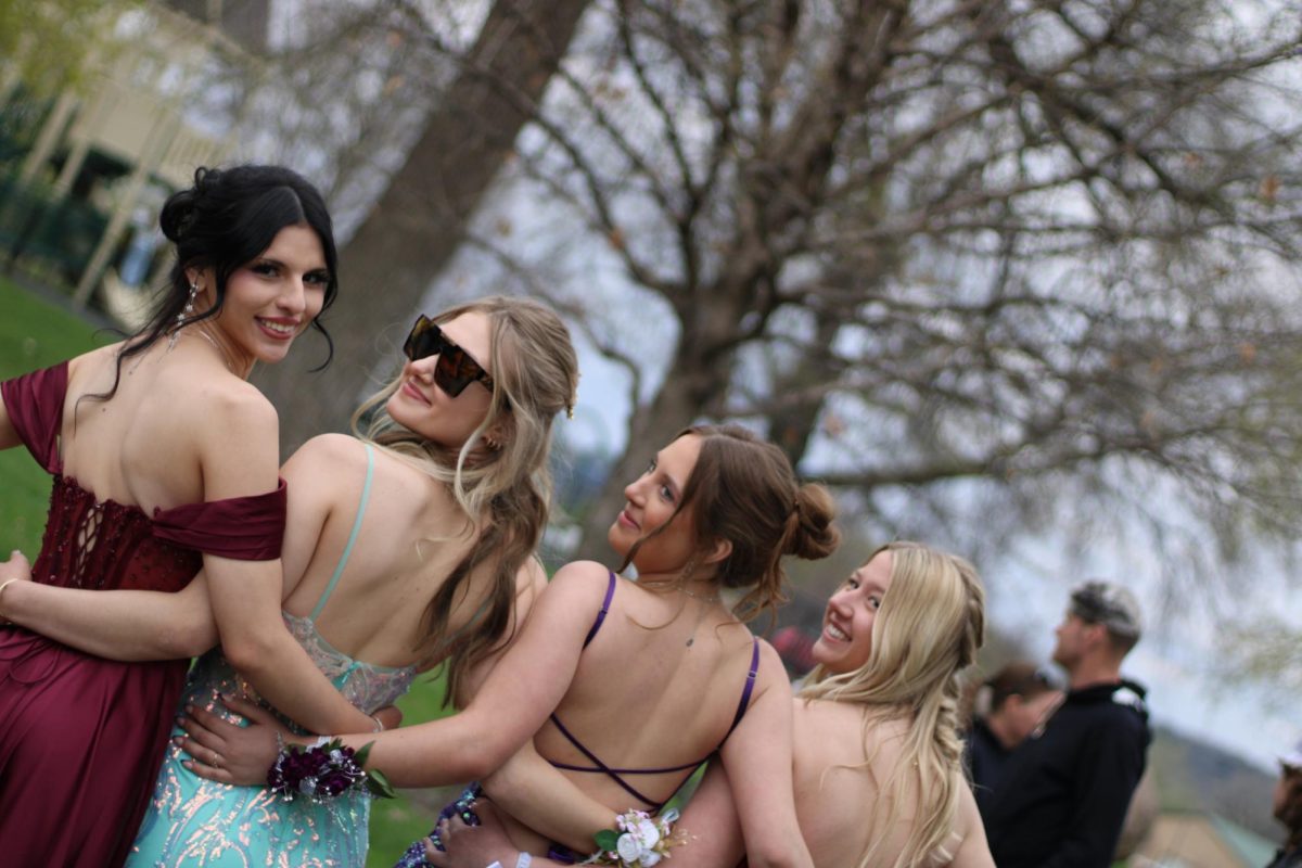 Seniors Siana Friedrich-Reyes, Courtney Bach, Junior Savanna Mallak and Sophomore Delilah Hendrichs looking back at the camera. 
