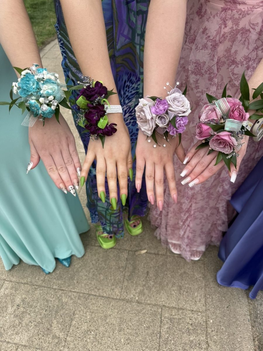 Students show off prom flowers