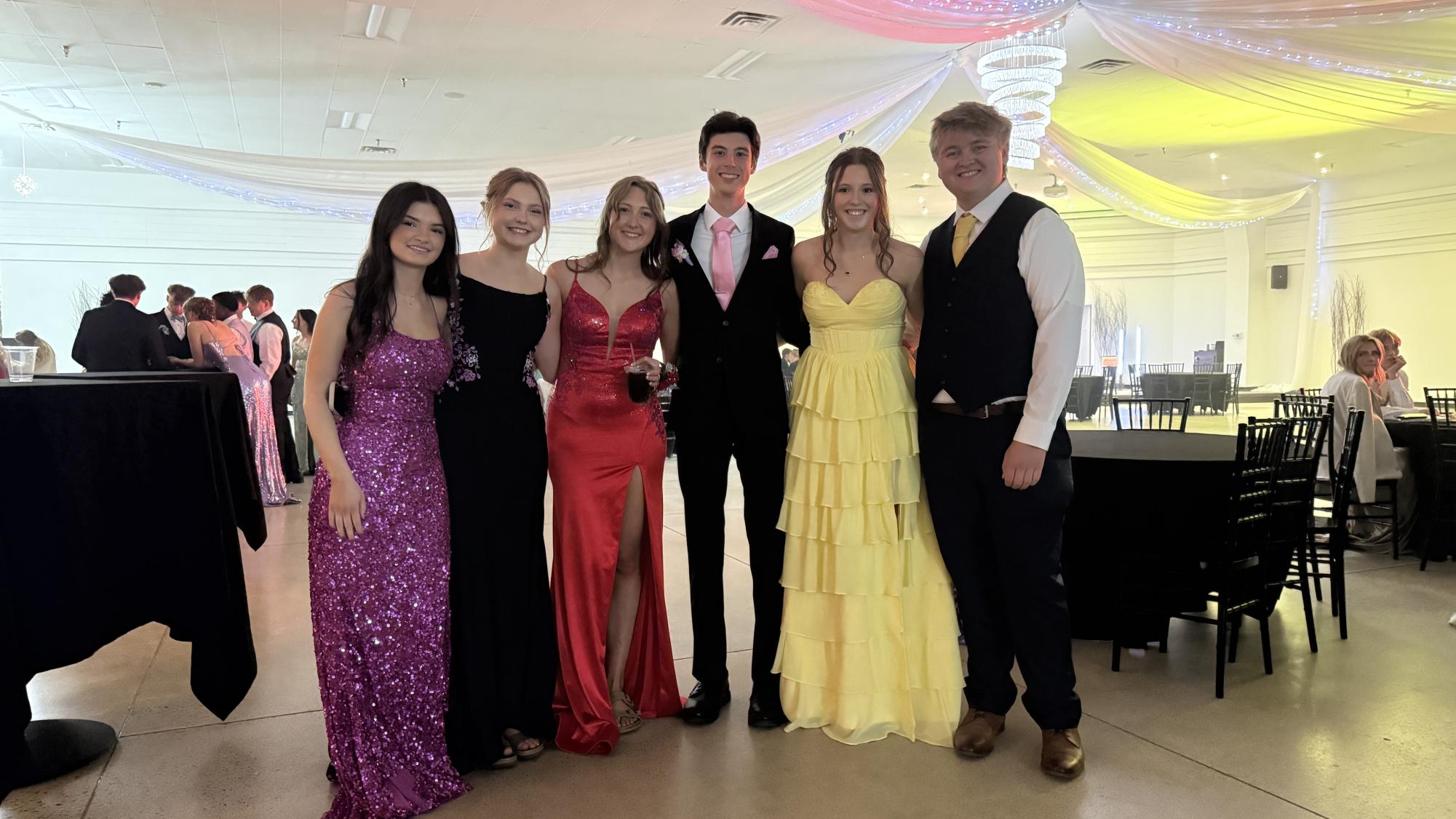 A group of prom-goers enjoying the evening at the Royal Oak Event Center.