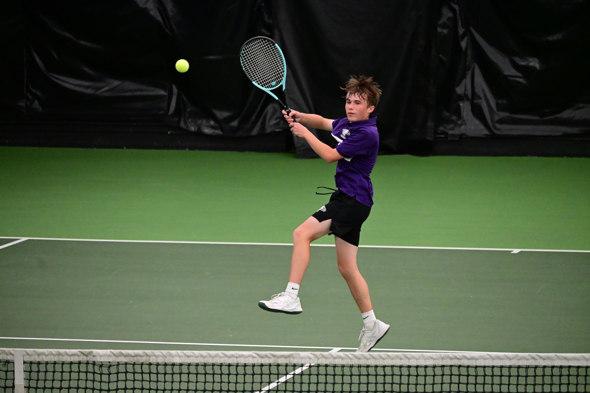 Griffin Lehne (MVL Freshman) volleys an impressive backhand shot