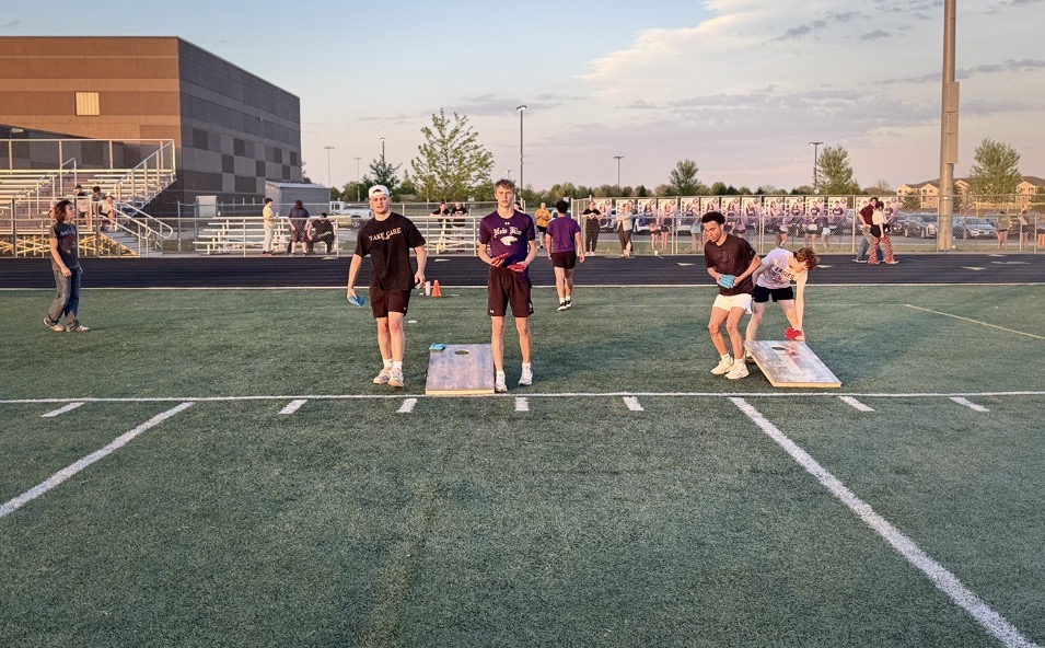 Bradyn Hagevolt & Jayden Broste on the left and Jamison Porter & Eli Zobel enjoying bean bags at the spring event 